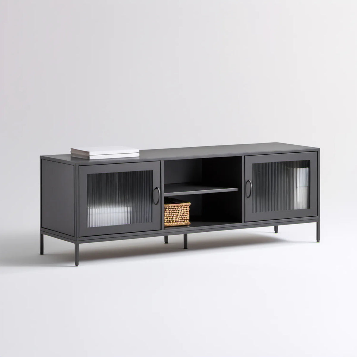 Czarna szafka RTV 140 x 40 x 60 cm z ryflowanym szkłem